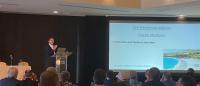 Dr. Guy M. McKhann delivering the NSA Presidential Address to attendees.